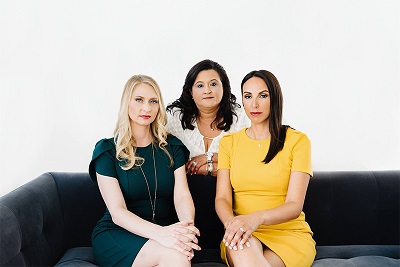 photo of attorney Whitney Lauren Hicks, paralegal Norina Sanchez and attorney Angie Roberts-Huckaby